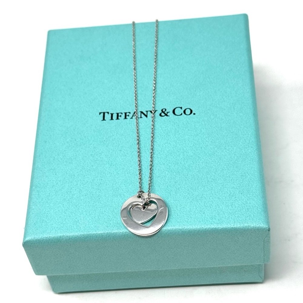 Authentic Tiffany &Co Stencil Cutout Two Heart Charm Necklace.